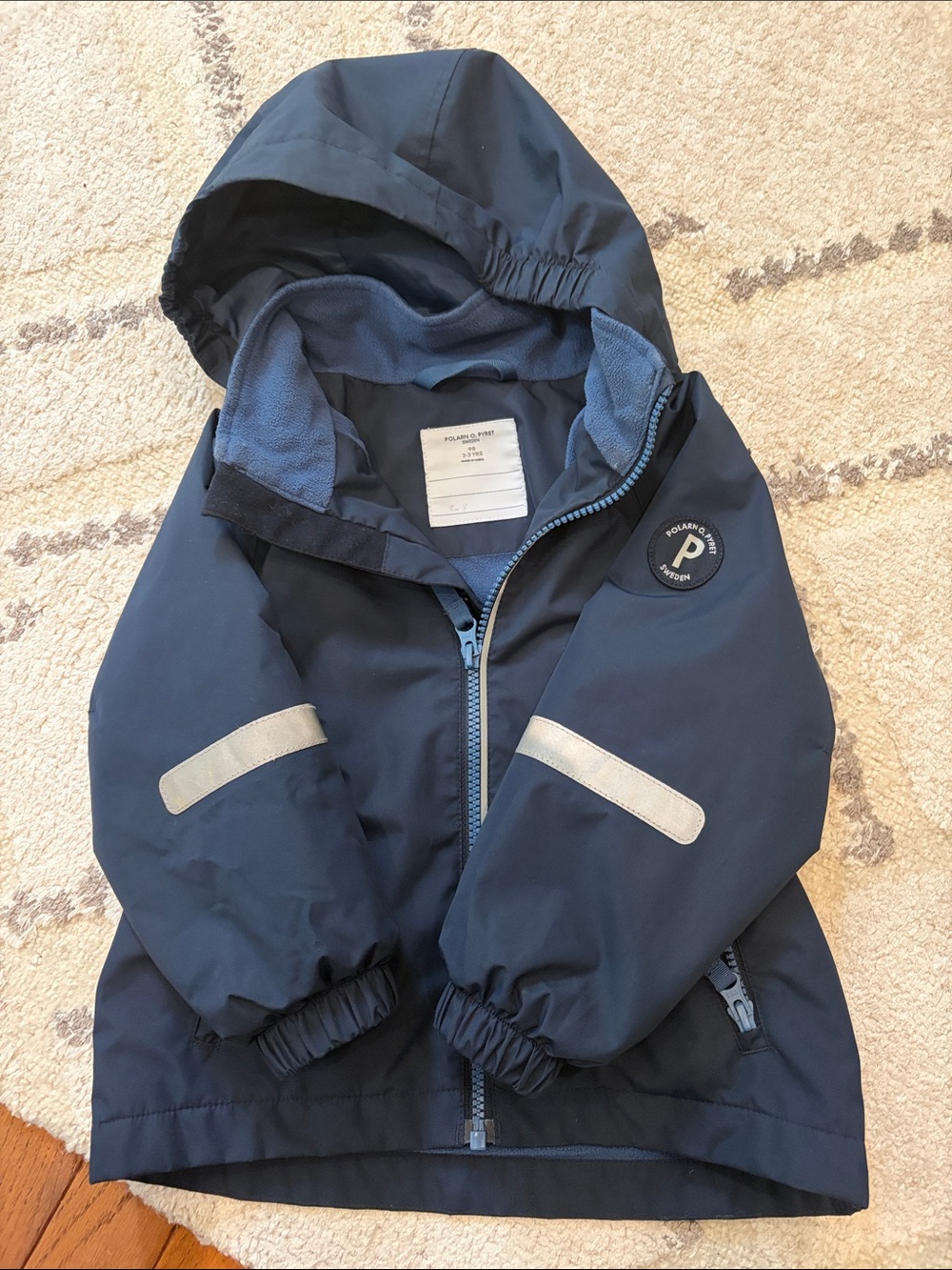 Polarn O. Pyret Navy Blue Hooded Kids Raincoat with Reflective Strips